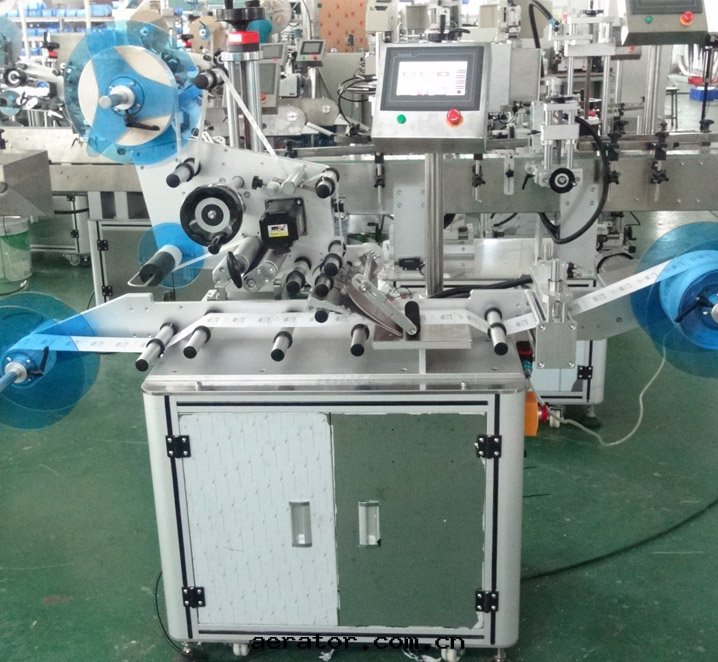 全自(zì)動(dòng)卷(juǎn)膜貼标機(jī)